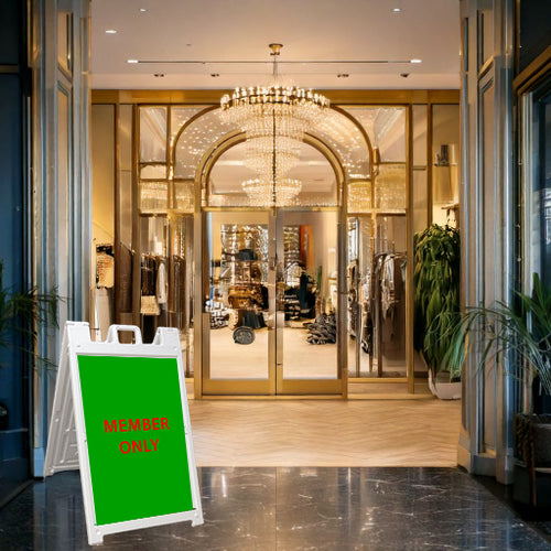 a signicade a frame in front of a store, showing member only
 
