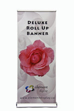 Load image into Gallery viewer, front facing view of deluxe roll up banner with flower graphic
