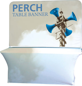 table draped in white table cover with a table banner behind it