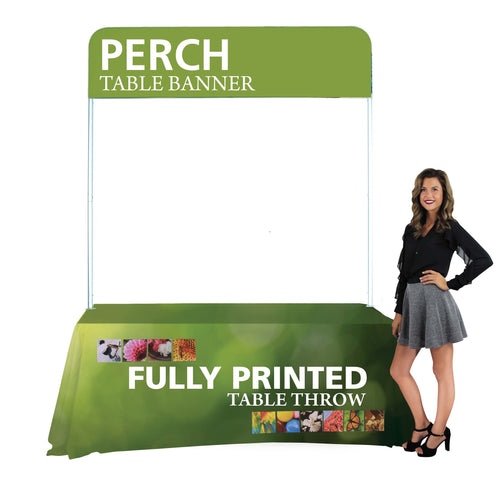 woman posing next to table draped in custom printed table cover and a banner on top 