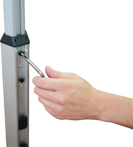 person holding hex screw tightening the telescopic pole to adjust height