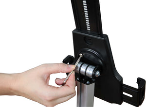 person holding hex screw tightening the tablet holder